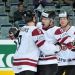 Latvians claim first IIHF win
