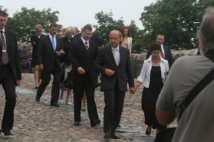 The three Baltic prime ministers (from left Est. PM Andrus Ansips, Lat. PM Valdis Dombrovskis and Lith. PM Andrius Kubilius) descend from Gediminas Tower while a crowd of befuddled journalists and photographers attempt to take photos and ask questions. Photo by Nathan Greenhalgh. 