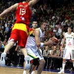 Marijonas Petravičius dodges a Spanish players defense. Photo by Ray Vyšniauskas.