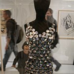 A girl admires Spanish designer Paco Rabanne's disc dress at Friday's opening. Photo by Nathan Greenhalgh