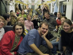 A group of Couch Surfing members hailing from several different countries take a train in Lithuania for a group excursion.