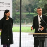 David Crowley (right), the exhibit curator, gives a speech at the Friday evening opening. Photo by Nathan Greenhalgh.