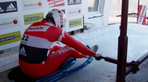 Pole Maciej Kurowski pushes off on his second run to finish in 21st place at the FIL European Luge Championships held this weekend in Sigulda. Photo by Jared Grellet.