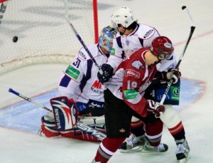 Miķelis Rēdlihs vies for position in front of the Metalurg goal, obscuring the vision of the Metalurg goalie for Guntis Galvins' shot to find the back of the net. Photo used courtesy of Dinamo Riga.