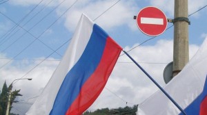The site's owner chastises ethnic Russians in Latvia that have put a Russian flag on their automobile.