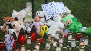 The Drąsius Kedys case has tapped into Lithuanians’ cynicism and righteous indignation with the state of their country’s criminal defense system, inspiring protests in favor of what are speculated to be vigilante killings. The sign in the photo translates to "Drąsius Kedys, daughter protector." Photo by Nathan Greenhalgh.