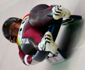 Latvian luger Guntis Rēķis slides down the now-infamous Vancouver track. Rēķis said given the high speed, every ride down was a fight for survival