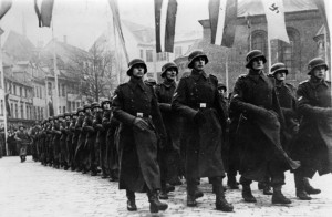 The Latvian Legion of the Waffen-SS marches in Riga in 1943. The legacy of Latvian collaboration with the Nazis against the Soviets remains a point of contention 60 years later.