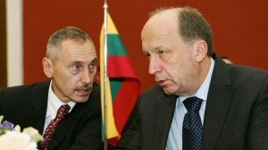 Prime Minister Andrius Kubilius (right) speaks with energy minister Arvydas Sekmokas. The Lithuanian government's has made a concerted effort to weaken Gazprom's hold over the Lithuanian heating market, and the prime minister's office said last week's demand could be a form of retaliation.