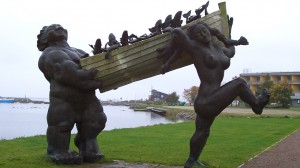 Toell the Great and his wife carry a boat full of fish, perhaps to cook for a romantic dinner in Saaremaa?