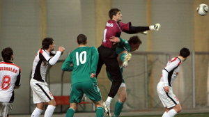 Sūduva goalkeeper Armantas Vitkauskas heads a ball out of the goal area during Wednesday's game against Levadia Tallinn. Neither team scored a goal.